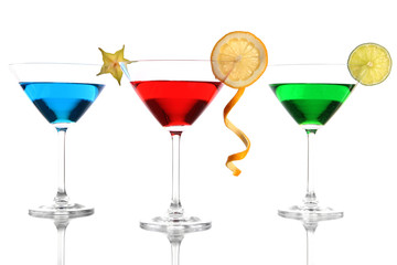 Alcoholic cocktails in martini glasses isolated on white