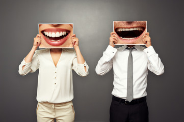 photo of laughing merrily couple