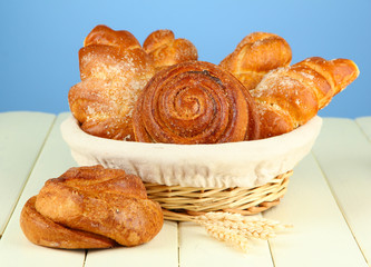 Composition with buns in wicker basket,
