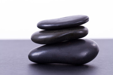 Obraz na płótnie Canvas Three Black Massage Stone Balanced