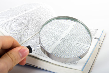 Magnifying Glass and Dictionary