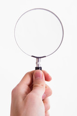 Hand Holding Magnifying Glass