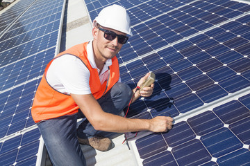 Solar panels with technician