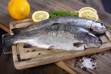 Two trout, pepper and lemon.