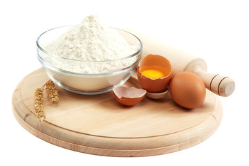 Bakery ingredient. Flour with raw eggs for making dough isolated