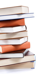 A stack of books on a white background.