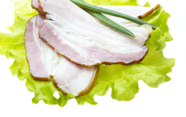 Fototapeta na wymiar Bacon with salad leaves
