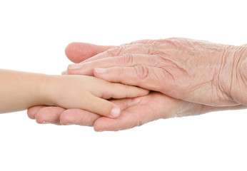 hands of the old man hold a hand of the baby. isolated on white 