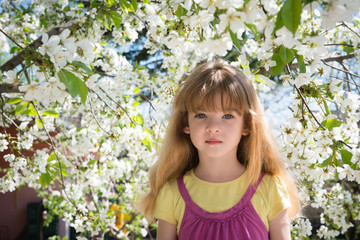 little girl with flowers