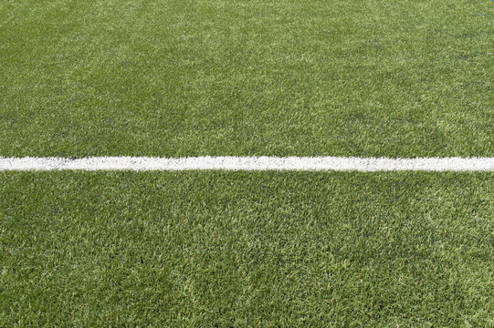 Close up of soccer field with single line and  copy space