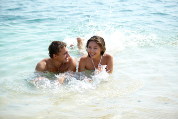 Couple splashing