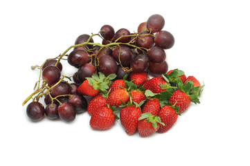 Strawberries and grapes isolated on white background