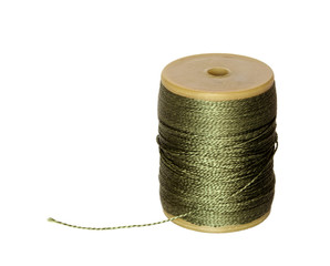 Thread bobbin isolated on white background