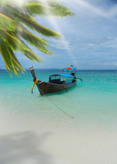 Longtail boat on the sea tropical beach