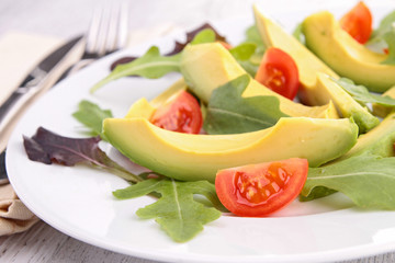 salad with avocado and cherry tomato