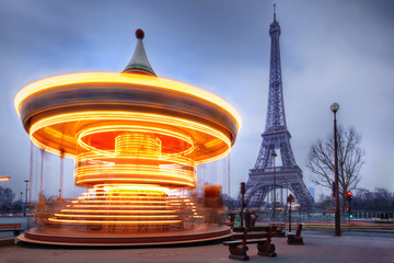 moving carousel close to Eiffel Tower, Paris