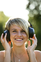 Young woman listening to music