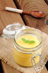 Obraz na płótnie Canvas Homemade lemon curd in a jar