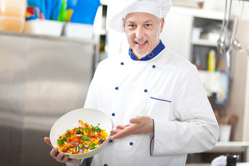 Chef showing a salad