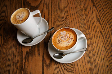 two cups cappuccino and latte