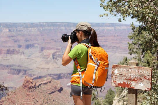 Hiking photographer taking pictures, Grand Canyon