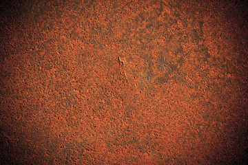 Dark edged rusty metal plate background