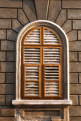 vintage window with closed shutters