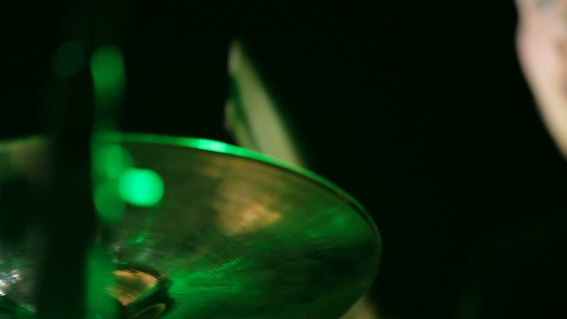 Drummer performing in a nightclub. Close-up