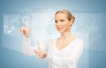 businesswoman touching virtual screen