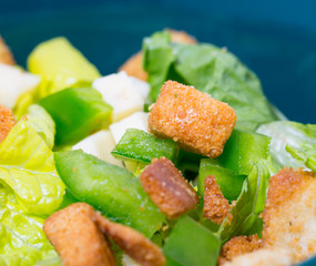 macro shot of salad with croutons
