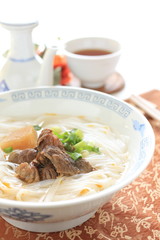 chinese cuisine, simmered beef tendon on hofan rice noodles