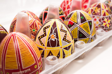 Eggs in box with pattern for Easter holiday - obrazy, fototapety, plakaty