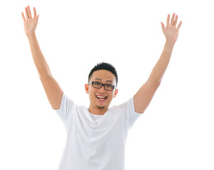 Fototapeta premium casual asian man jumping celebrating success with isolated white