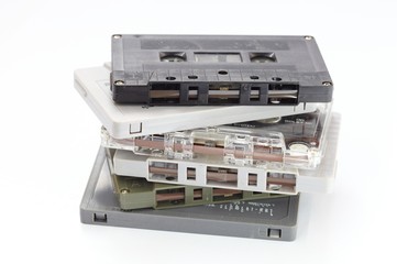 Old cassette tapes on white background