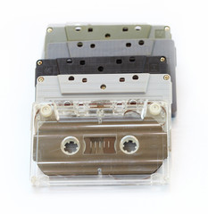 Old cassette tapes on white background