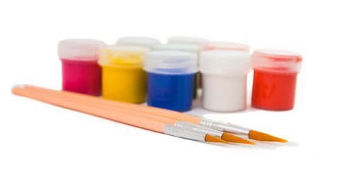 gouache of paint and brush