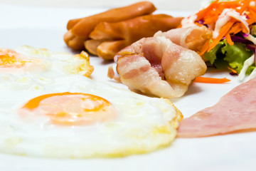 Breakfast eggs bacon and sausage