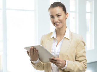 Pretty business woman smiling confidently