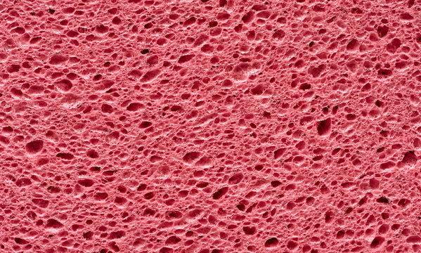 pink sponge with porous texture background