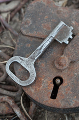 Old padlock with key