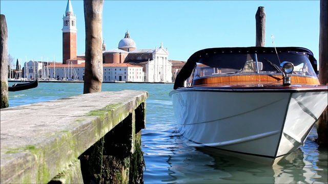 Boat bobing up and down in the laguna of Venice