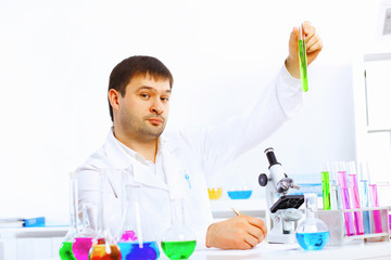 Young male scientist working in laboratory