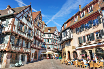 Marchands square with alsatian style houses in Colmar - obrazy, fototapety, plakaty
