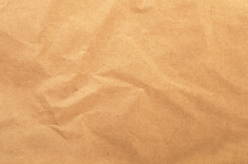 Fototapeta na wymiar Brown rough crumpled recycled paper texture