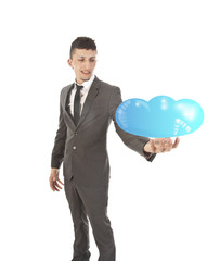 Young man holding cloud concept isolated on white background