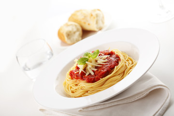 Spaghetti with tomato sauce and basil
