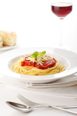 Spaghetti with tomato sauce and basil