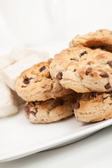 Chocolate chip cookies and chocolate candy on plate