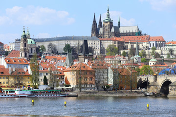 Obraz premium Spring Prague gothic Castle with Charles Bridge, Czech Republic
