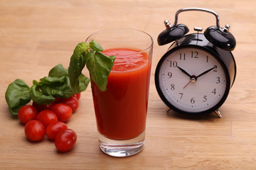 Tomato juice and clock